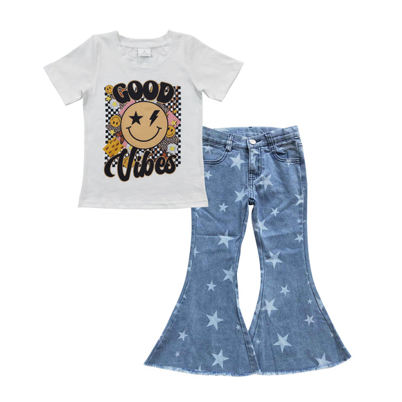 good vibes smile girl top + star jeans outfits