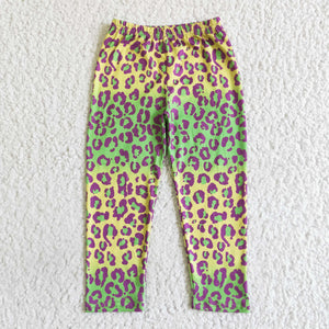yellow and green leopard trousers